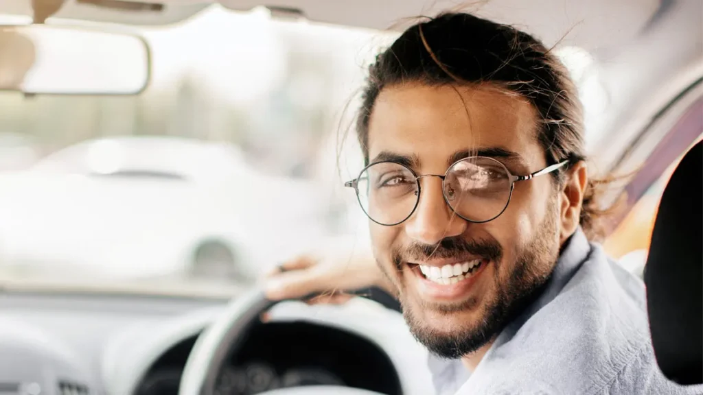 Taxi driver in cab