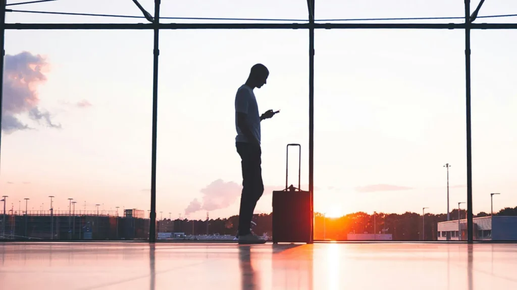 Male with luggage in airport